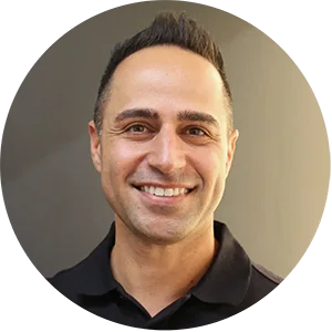 Professional portrait of Dr. Khaef, an experienced and compassionate dentist at Pure Santa Ana Dentist.
