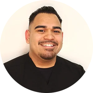 Professional portrait of Eric Corrales, the dedicated Office Manager ensuring a smooth and welcoming patient experience at Pure Santa Ana Dentist